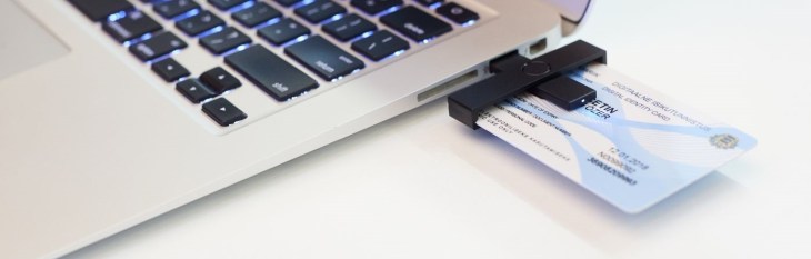 Photo of Estonian ID card being used to vote online